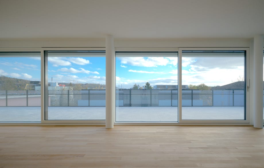 Innenansicht Verglasung Dachgeschoss. Hansjörg Betschart Architektur ©.